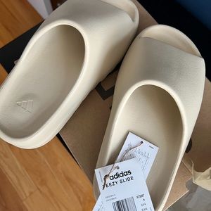 brand new Yeezy slides size 9